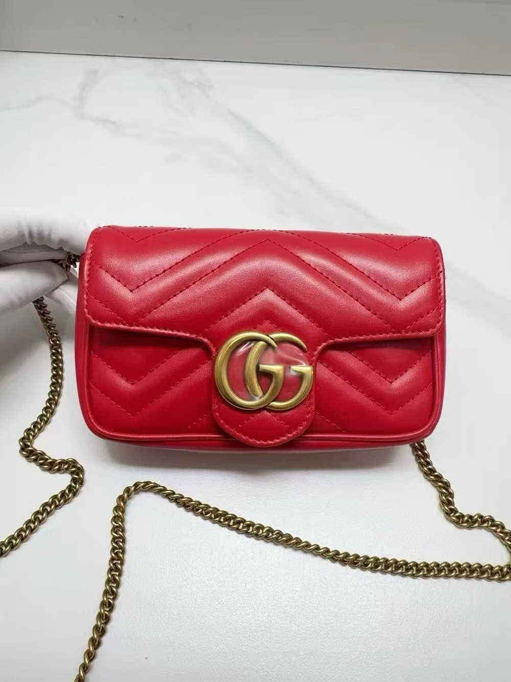 NWOT 100% Auth Gucci supermini marmont leather bag in red w/ gold tone hardware
